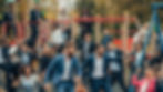 A group of business people playing on a playground