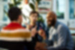 three people having a casual meeting