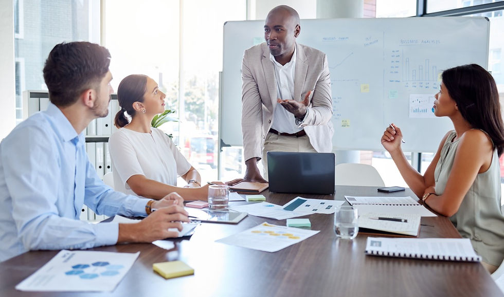 a group of people in a business meeting