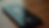 High angle view of a smartphone displaying a podcast app interface