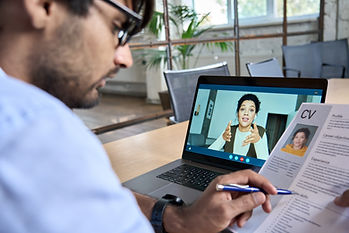 a person having an interview on a laptop